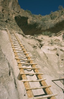 USA, New Mexico, Bandalier, Wooden ladder into Anasazi Indian cave dwelling in the national