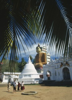 SRI LANKA, Wewurukannala Vihara, Site of giant seated Buddha constructed in 1970 with visiting