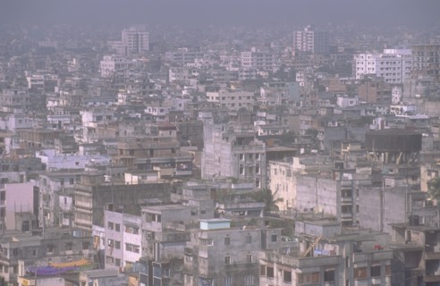 BANGLADESH, Dhaka, Elevated view over city architecture with high rise buildings in a densely