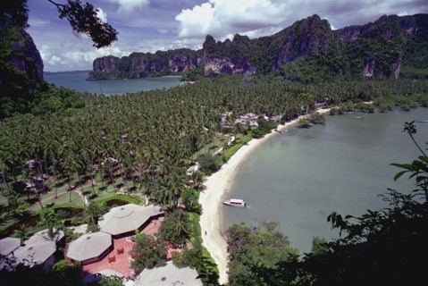 THAILAND, Krabi, Aerial view over Rai Ley beach with palm covered land strip