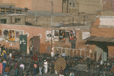 MOROCCO, Marrakech, Bicycles and mopeds lined up outside cinema