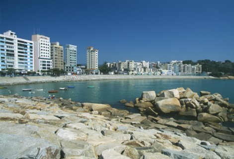 HONG KONG, Stanley, View over the beach with high res apartment buildings along shore
