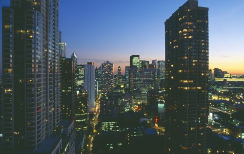USA, Illinois, Chicago, Cityscape at night looking south down Rush and Wabash streets in the Near