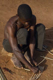 CENTRAL AFRICAN REPUBLIC, People, Sango tribesman making fishing traps with twigs and reeds