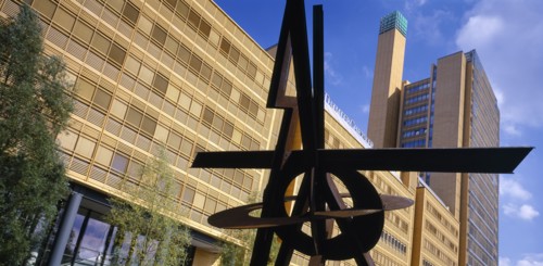 GERMANY, Berlin, Potsdamer Platz. Exterior view of the Daimler City Building with modern sculpture