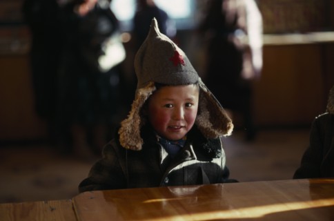 MONGOLIA, People, Children, Child in shop wearing hat with long ear flaps