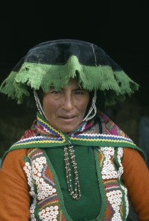 PERU, Cordillera Vilcanota, Head and shoulders portrait of woman from Tinqui.