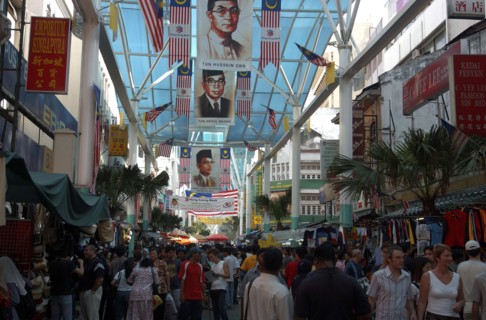 MALAYSIA, Kuala Lumpur, Chinatown, View along a covered market street lined with stalls