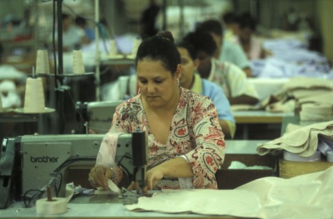 SOUTH AFRICA, Western Cape, Cape Town, Female sewing machine operators at Pre Les bedroom textiles