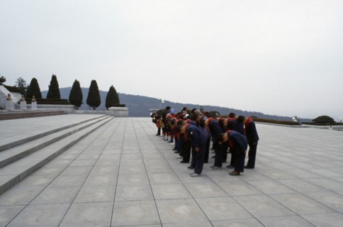 NORTH KOREA, Pyongyang, Group of children paying their respects at the Tomb of the Martyrs outside