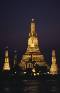 THAILAND, South, Bangkok, Wat Arun The Temple of The Dawn illuminated at sunset