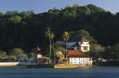 SRI LANKA, Kandy, Temple of the Tooth aka Dalada Maligawa. View over river toward the Buddhist