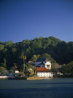 SRI LANKA, Kandy, Temple of the Tooth aka Dalada Maligawa. View over river toward the Buddhist
