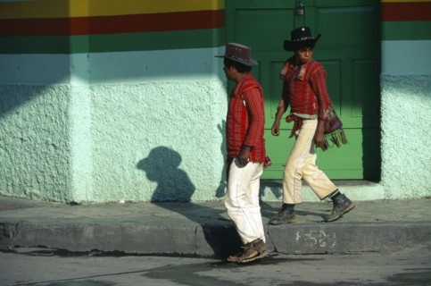 GUATEMALA, Western Highlands, Mayan Indian men from the Sierra los Cuchumatanes at the busy market