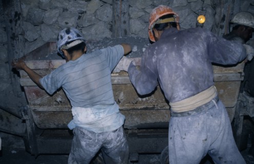 BOLIVIA, Potosi, Cerro Rico, "Rosaria mine.  Mining for tin and silver, miners working underground