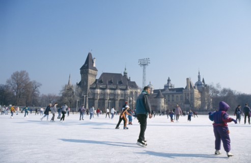 HUNGARY, Budapest, Ice skaters on outdoor rink.