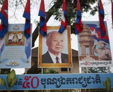 CAMBODIA, Poipet, Billboard image of King Sihanook