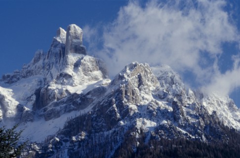 ITALY, Trentino Alto Adige, Dolomites, Snow covered peaks near San Martino del Castrozza.