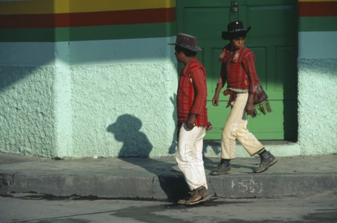 GUATEMALA, Huehuetanango, Mayan Indian men from the Sierra Los Cuchumatanes in street in Western