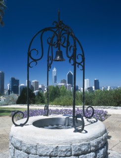 AUSTRALIA, Western Australia, Perth, Kings Park well with ornamental ironwork and bell with the