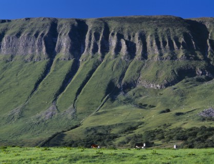 IRELAND, Sligo, Ben Bulben, View toward the flat topped limestone hill with eroded folds and gullys