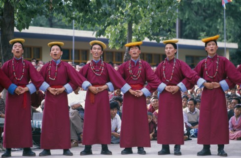 INDIA, Himachal Pradesh, Festivals, Tibetans in traditional costume celebrating the birthday of the