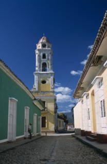 CUBA, Sierra de Trinidad, Trinidad, View along street of colourful colonial architecture toward