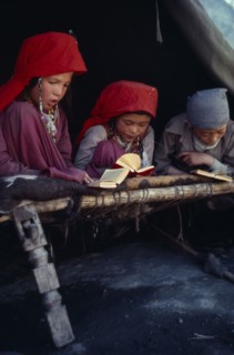 AFGHANISTAN, Kirghiz, Kirghiz boys and girls reading the Koran.