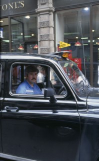 TRANSPORT, Road, Taxi, Detail of London cabbie in his taxi
