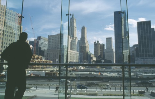 USA, New York, Manhattan, People looking over Ground Zero during reconstruction of the World Trade