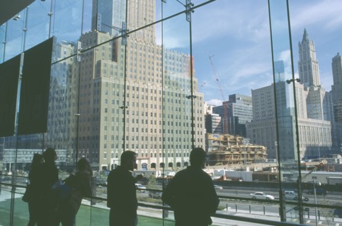 USA, New York, Manhattan, People looking over Ground Zero during reconstruction of the World Trade