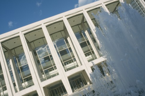 USA, New York, Manhattan, Lincoln center with fountain outside entrance