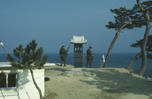 SOUTH KOREA, Demilitarized Zone, Armed guards on the east coast looking out from North Korean