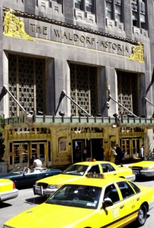 USA, New York State, New York City, Waldorf Astoria Hotel and yellow taxis