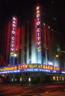 USA, New York State, New York City, Radio City Music Hall and the Rockefeller Centre illuminated at