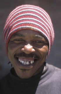 SOUTH AFRICA, Western Cape, Stellenbosch, Portrait of male farm worker at Mooiberg fruit and