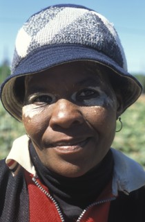 SOUTH AFRICA, Western Cape, Stellenbosch, Portrait of a female agricultural farm worker at Mooiberg
