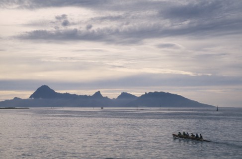 PACIFIC ISLANDS, French Polynesia, Tuamotu Islands, Ringiroa.  Kayak on water in low light with