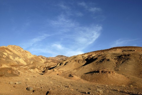 USA, California, Death Valley, View toward layered sculpted rock hills
