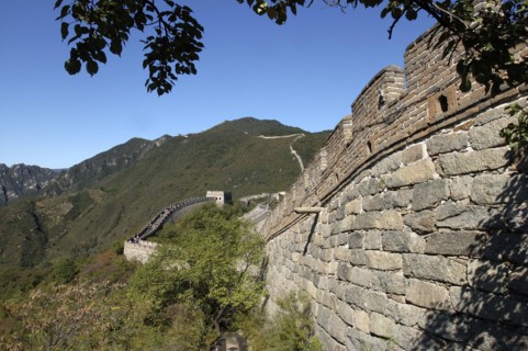 CHINA, Great Wall, View alongside a section of the wall which runs through the hilly green