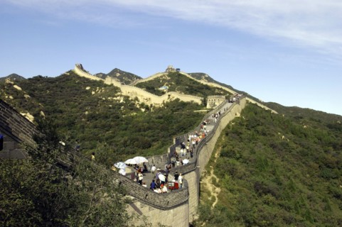 CHINA, Great Wall, View alongside a section of the wall which runs through the hilly green