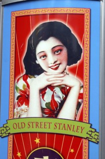 HONG KONG, Hong Kong Island, Stanley, Old Street Stanley sign with image of young girl