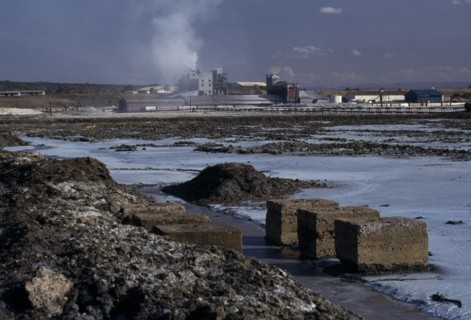 KENYA, Lake Magadi, View across Magadi Soda Lake towards factory buildings.