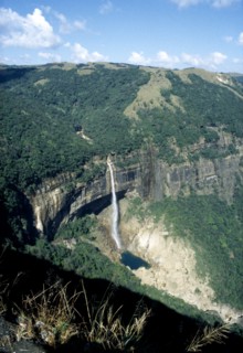 INDIA, Meghalaya, Cherrapunji, Waterfall cascading from plateau into plunge pool below