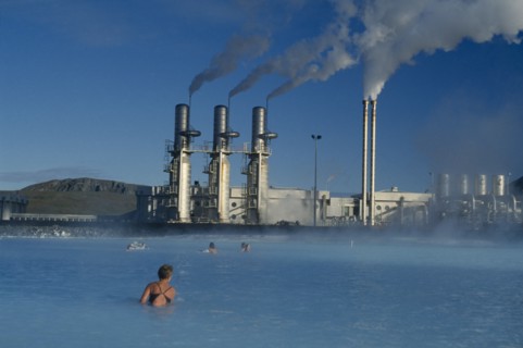 ICELAND, Gullbringu, Reykjanes, Svartsengi geothermal power plant with bathers in Blue Lagoon in