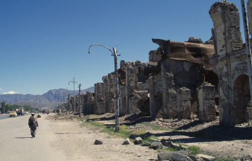 AFGHANISTAN, Kabul, Badly damaged housing lining street.