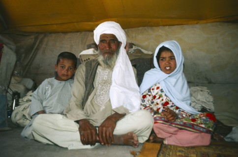 AFGHANISTAN, Nomadic LIfestyle, Portrait of nomad family in their tent.