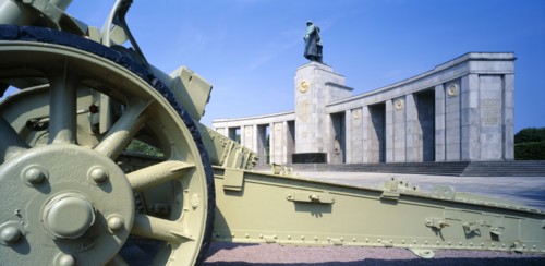 GERMANY, Berlin, Tiergarten. View over canon base toward the the Russian War Memorial with statue