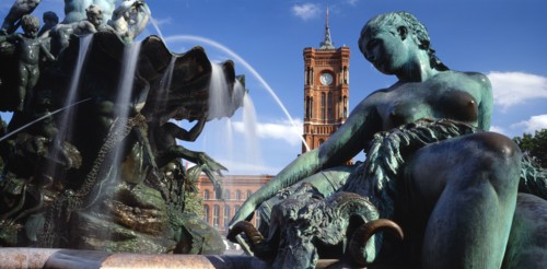 GERMANY, Berlin, Alexanderplatz. View of the Rathaus seen from the Neptune Fountain in the