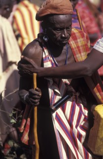 KENYA, Kajiado, Many of the Maasai men get so drunk on Gourds filled with honey beer that they can
